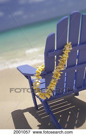 Close-Up Side Of Blue Beach Chair With Plumeria Hanging On Side View Large Photo Image Stock Photo - Close-Up Side Of Blue Beach Chair With Plumeria Hanging On Side. Fotosearch