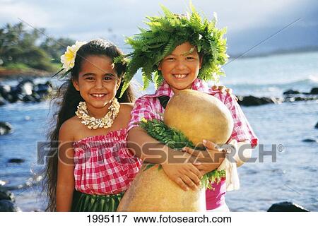 Closeup Of Two Smiling Keiki On Beach, Both Wear Palaka, Boy Holds Ipu. View Large Photo Image Stock Photo - Closeup Of Two Smiling Keiki On Beach, Both Wear Palaka, Boy Holds Ipu.. Fotosearch