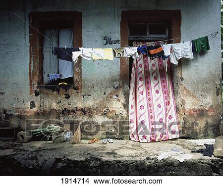 Clothes Line Hanging Outside House View Large Photo Image Picture - Clothes Line Hanging Outside House. Fotosearch