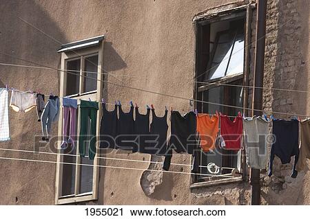 Stock Image - Clothesline against building in Sarajevo, Bosnia and Herzegovina. Fotosearch