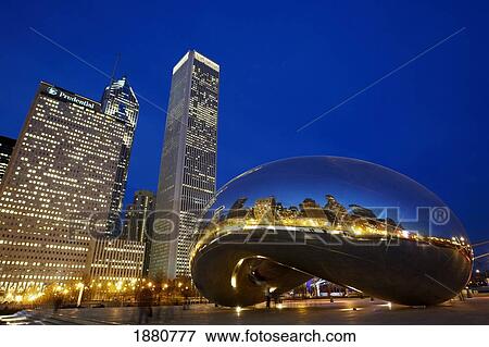 Stock Photo - Cloud Gate (The Bean) Sculpture In Front Of Skyscrapers At Night, Chicago, Illinois, Usa. Fotosearch