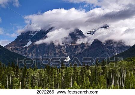 Stock Photograph - Clouds Around Mountains, Robson Provincial Park, British Columbia. Fotosearch