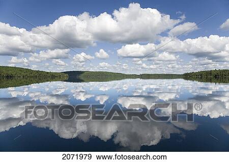 Clouds Reflected On Smoke Lake, Algonquin Park, Ontario View Large Photo Image Stock Photo - Clouds Reflected On Smoke Lake, Algonquin Park, Ontario. Fotosearch
