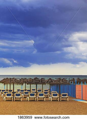 Cloudy Sky Over Playamar Beach; Torremolinos, Spain View Large Photo Image Stock Photo - Cloudy Sky Over Playamar Beach; Torremolinos, Spain. Fotosearch