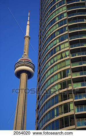 Stock Image - Cn Tower And Condo Building, Toronto, Ontario. Fotosearch