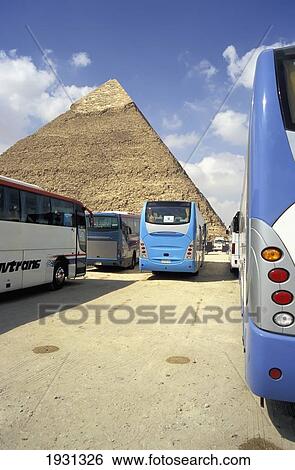 Stock Photograph - Coaches Parked At Chephren Pyramid, Giza, Egypt; Giza, Egypt &#13; &#10. Fotosearch