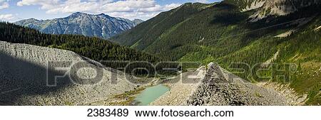 Stock Photo - Coast mountains and tents; Pemberton, British Columbia, Canada. Fotosearch