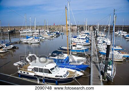 Coastal Village And Boats In The Marina At Watchet, Exmoor National Park, Somerset, Uk View Large Photo Image Stock Photo - Coastal Village And Boats In The Marina At Watchet, Exmoor National Park, Somerset, Uk. Fotosearch