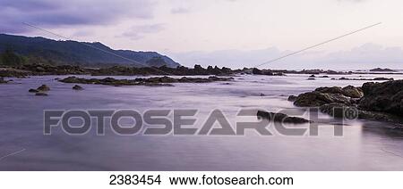 Picture - Coastline at sunset; Costa Rica. Fotosearch