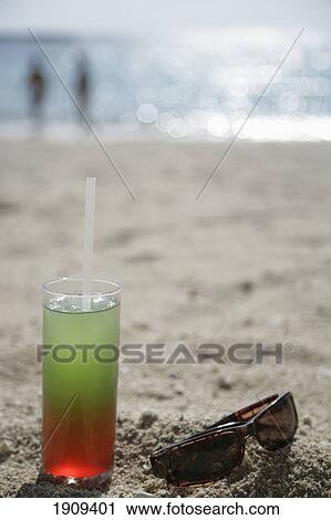 Cocktail Drink And Sunglasses On Beach At Mayan Riviera, Yucatan Peninsular, Quintana Roo State, Mexico View Large Photo Image Stock Image - Cocktail Drink And Sunglasses On Beach At Mayan Riviera, Yucatan Peninsular, Quintana Roo State, Mexico. Fotosearch