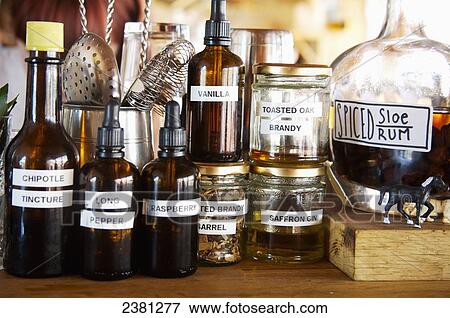 Stock Photo - Cocktail tinctures at the Ethicurean, Barley Wood Walled garden; Wrington, England. Fotosearch