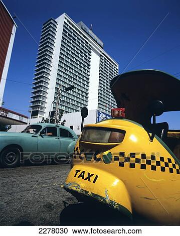 Coco Taxi and Hotel Habana Libre La Rampa (Calle 23) in Vedado; Havana, Cuba View Large Photo Image Stock Image - Coco Taxi and Hotel Habana Libre La Rampa (Calle 23) in Vedado; Havana, Cuba. Fotosearch