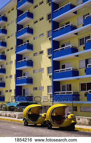 Stock Photograph - Coco Taxis; Varadero, Matanzas, Cuba. Fotosearch