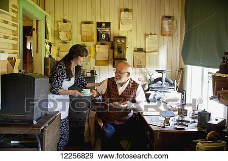 Stock Photo - Coffee break in Kilby General Store Museum at Kilby Historic Site; Harrison Mills, British Columbia, Canada. Fotosearch
