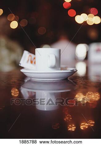 Coffee Cup And Saucer On A Table In A Cafe, Lisbon View Large Photo Image Stock Photo - Coffee Cup And Saucer On A Table In A Cafe, Lisbon. Fotosearch