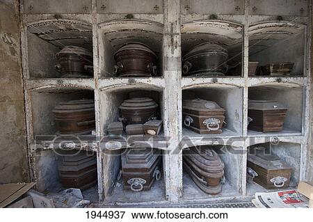 Stock Photo - Coffins in abandoned niches at the Cementerio de la Recoleta, Buenos Aires, Capital Federal, Argentina. Fotosearch
