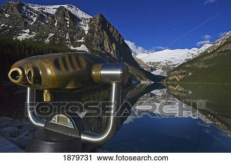Stock Image - Coin-Operated Binoculars At Lake Louise.. Fotosearch