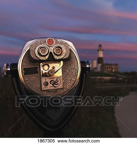 Stock Photography - Coin-Operated Binoculars With Lighthouse, Sag Harbor, New York, Usa. Fotosearch