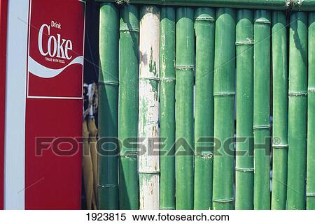 Coke Machine And Bamboo Fence View Large Photo Image Stock Photography - Coke Machine And Bamboo Fence. Fotosearch