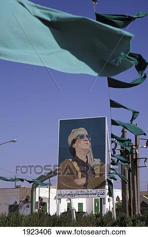 Stock Photograph - Col. Gaddafi & Libya Flags. Fotosearch