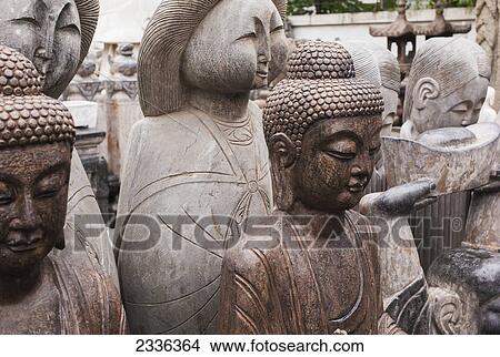 Collection Of Statues At The Panjiayuan Antique Market; Beijing, China View Large Photo Image Picture - Collection Of Statues At The Panjiayuan Antique Market; Beijing, China. Fotosearch