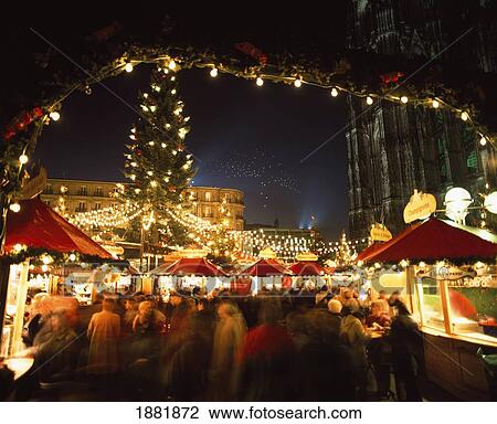 Stock Image - Cologne Cathedral And Christmas Market. Fotosearch