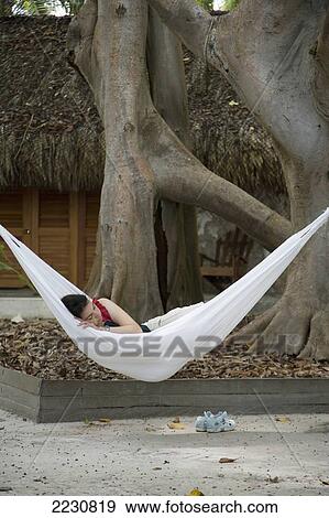Colombia, Cartagena, Person Relaxing In Hammock; Islas Del Rosario View Large Photo Image Stock Photo - Colombia, Cartagena, Person Relaxing In Hammock; Islas Del Rosario. Fotosearch