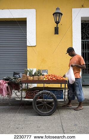 Stock Photo - Colombia, Fruit Seller; Cartagena. Fotosearch
