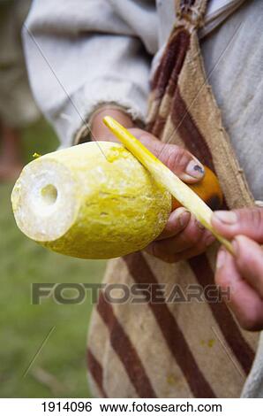 Stock Photograph - Colombia, Koguis man holding 'poporro'; Sierra Nevada De Santa Marta. Fotosearch