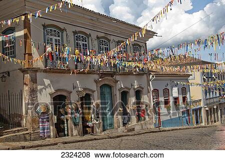 Stock Photo - Colonial Portuguese buildings festooned with carnival decorations; Ouro Preto, Minais Gerais, Brazil. Fotosearch