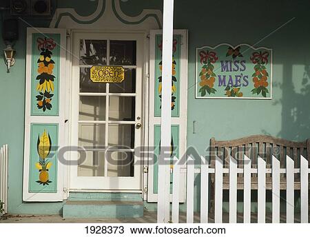 Stock Image - Colonial Style Painted Houses. Fotosearch