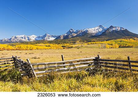 Colorado, Dallas Divide, Beautiful Autumn Landscape, Snow Covered Aspen Mountains In Distance. View Large Photo Image Stock Image - Colorado, Dallas Divide, Beautiful Autumn Landscape, Snow Covered Aspen Mountains In Distance.. Fotosearch