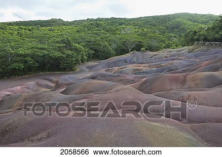 Stock Photograph - Colored Earths Of Chamarel. These Seven-Colored Dunes Are A Result From The Weathering Of Volcanic Rocks., Mauritius. Fotosearch