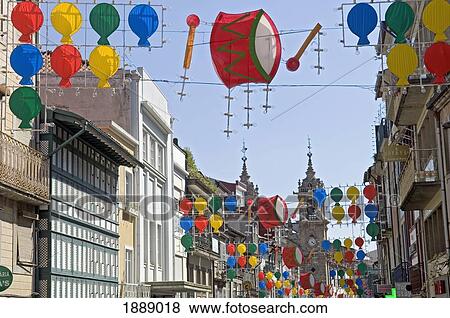 Stock Photo - Colorful Banners Hanging Between Buildings In Braga. Fotosearch