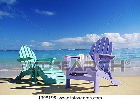 Colorful Beach Chairs On Beach, Calm Waves Washing Ashore Turquoise Water View Large Photo Image Stock Photography - Colorful Beach Chairs On Beach, Calm Waves Washing Ashore Turquoise Water. Fotosearch