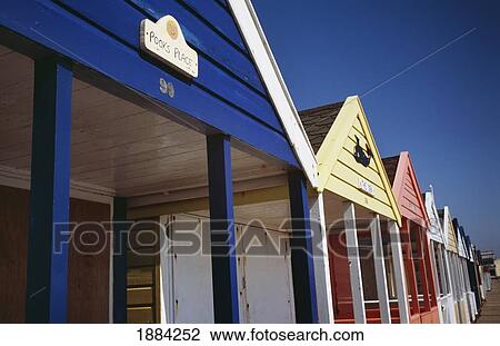 Stock Image - Colorful Beach Huts In Southwold, Close Up. Fotosearch
