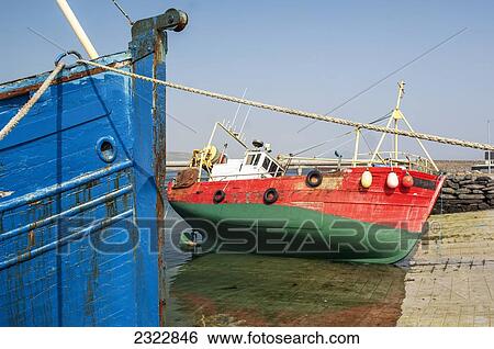 Colorful boats in Portmagee fishing village; Iveragh Peninsula, County Kerry, Ireland, UK View Large Photo Image Stock Photograph - Colorful boats in Portmagee fishing village; Iveragh Peninsula, County Kerry, Ireland, UK. Fotosearch