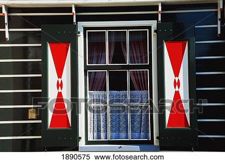 Stock Photography - Colorful House With Window Shutters. Fotosearch