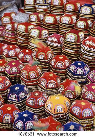 Colorful Prayer Hats For Sale In Street Market In Urumqi, Close Up View Large Photo Image Stock Image - Colorful Prayer Hats For Sale In Street Market In Urumqi, Close Up. Fotosearch
