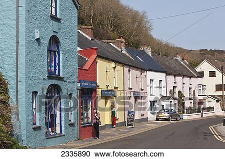 Colorful Shops And Townhouses; Solva, Pembrokeshire Coast Path, Wales, United Kingdom View Large Photo Image Stock Image - Colorful Shops And Townhouses; Solva, Pembrokeshire Coast Path, Wales, United Kingdom. Fotosearch