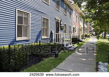 Colorful siding on neighbourhood houses; Charlottetown, Prince Edward Island, Canada View Large Photo Image Stock Photo - Colorful siding on neighbourhood houses; Charlottetown, Prince Edward Island, Canada. Fotosearch