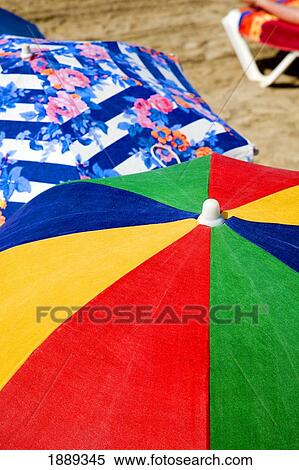 Colorful Umbrellas On The Beach, Close Up View Large Photo Image Stock Photography - Colorful Umbrellas On The Beach, Close Up. Fotosearch
