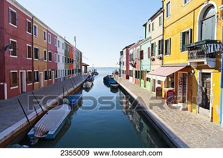 Coloured houses along a canal in Burano; Venice, Italy View Large Photo Image Stock Photo - Coloured houses along a canal in Burano; Venice, Italy. Fotosearch