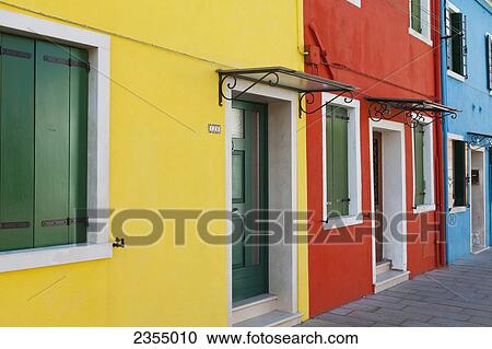 Stock Image - Coloured houses in Burano; Venice, Italy. Fotosearch