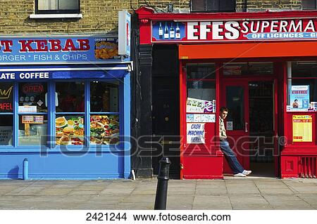 Colourful buildings along a city street, Shoreditch; London, England View Large Photo Image Picture - Colourful buildings along a city street, Shoreditch; London, England. Fotosearch