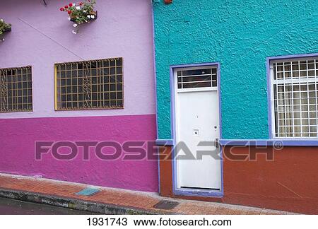 Stock Image - Colourful buildings along a street in La Candelaria; Bogota, Colombia. Fotosearch