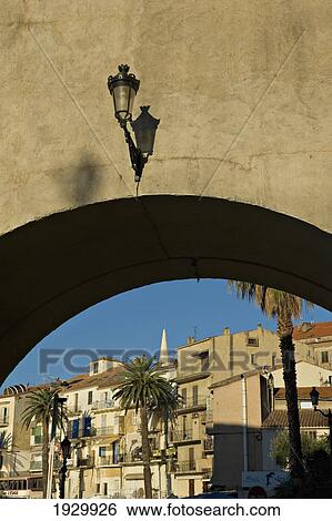 Stock Photograph - Colourful buildings along quai Landry at Calvi. The Balagne district. Corsica. France. Fotosearch