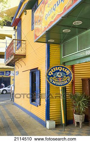 Stock Image - Colourful Buildings And A Sign For A Museum; Buenos Aires Argentina. Fotosearch