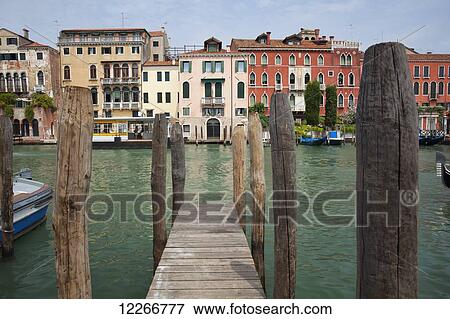 Colourful buildings on the Grand Canal from a dock; Venice, Italy View Large Photo Image Stock Photo - Colourful buildings on the Grand Canal from a dock; Venice, Italy. Fotosearch