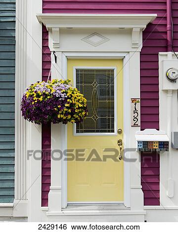 Stock Photograph - Colourful facade of a house and front door; St. John's, Newfoundland, Canada. Fotosearch